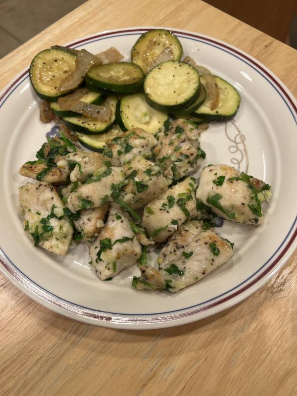 Chicken Persillade with zucchini and onions.